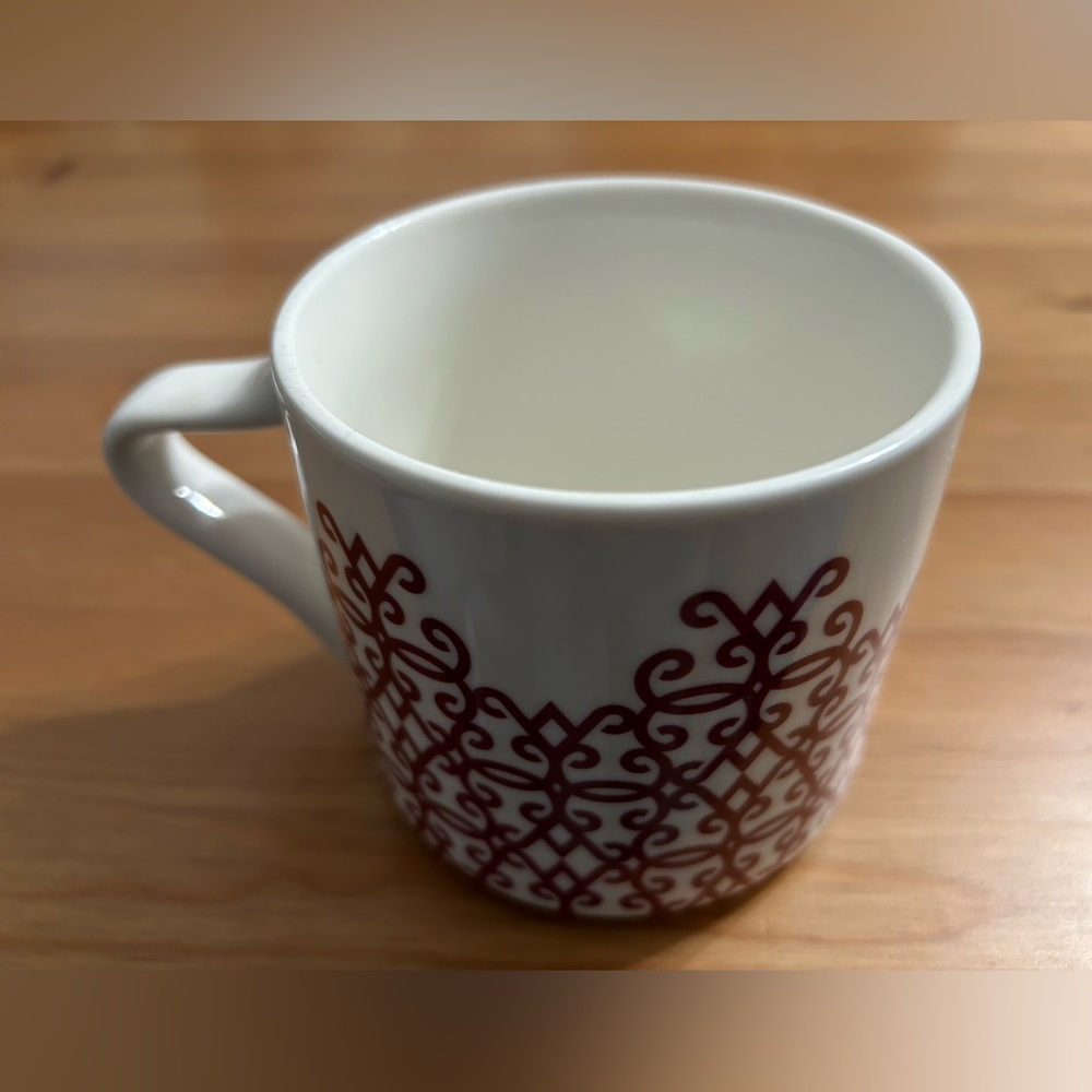 Starbucks coffee mug with red design